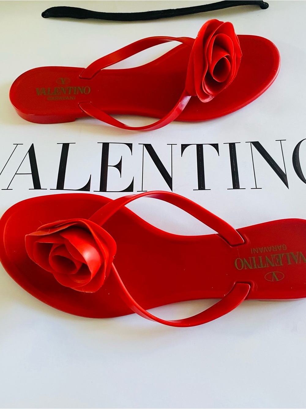 Valentino Garavani Women's Red Rose Jelly Flat Thong Sandals
Italy. Authentic.